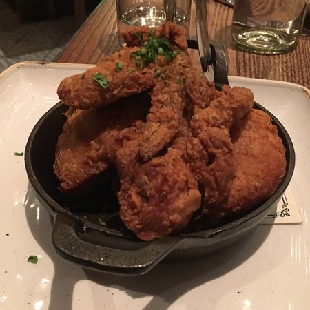 Yardbird signature dishes Lewellyn’s Fine Fried ChickenChicken & WafflesShrimp & GritsSt. Louis Style Pork Ribs